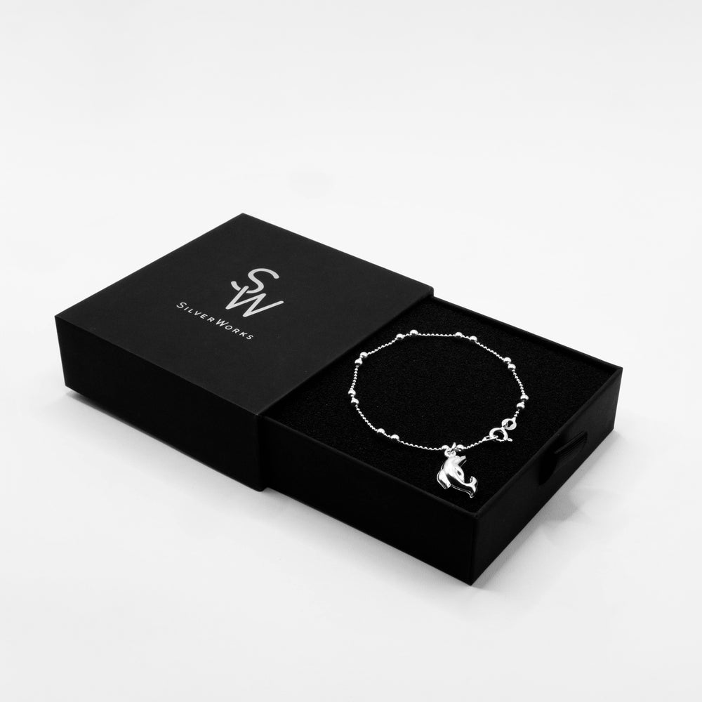 
                      
                        Dangling Dolphin 925 Sterling Silver Charm Bracelet
                      
                    