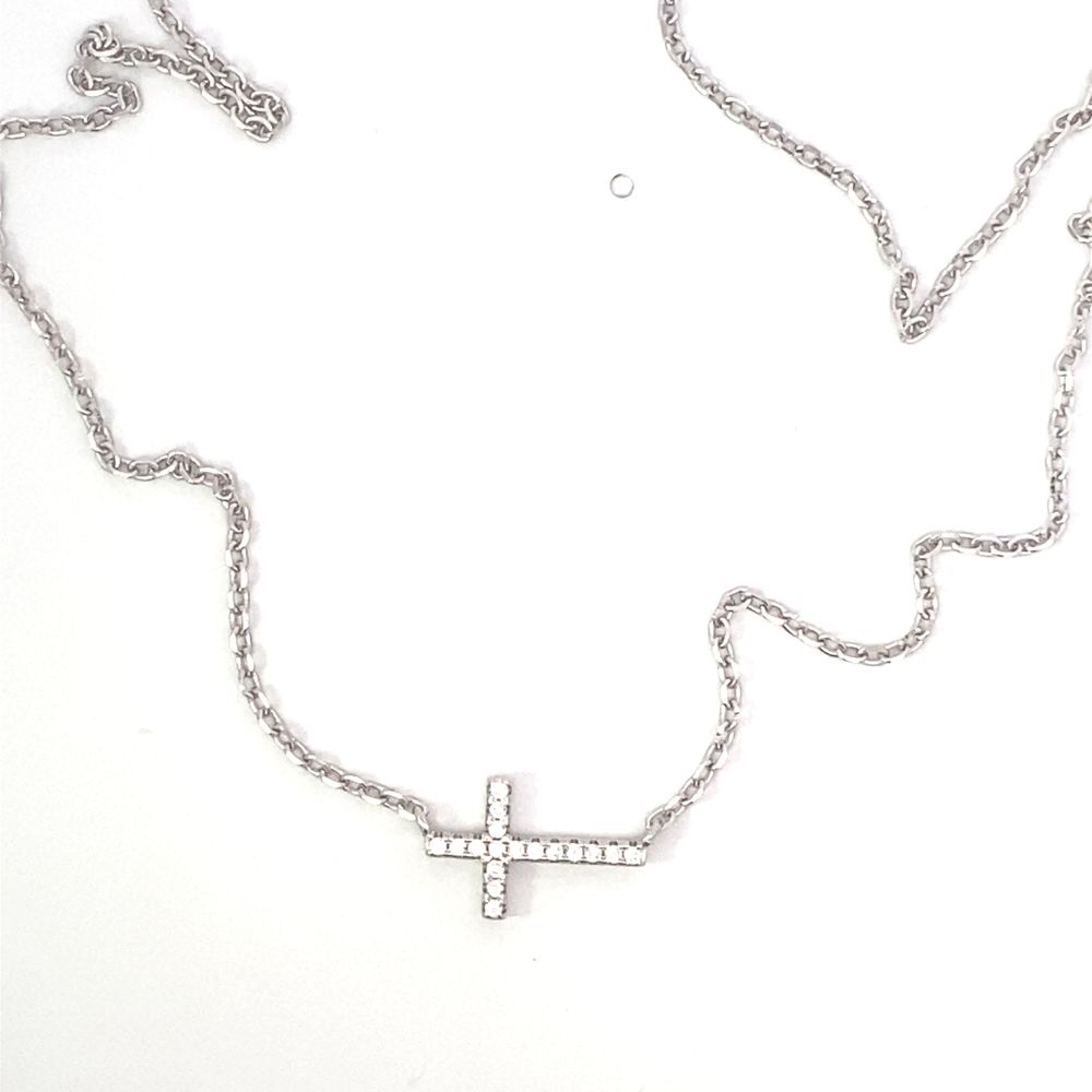 
                      
                        N5109 16IN+1IN VERTICAL CROSS IN FULL WHT CZ IN RHOD CHAIN 2.59G
                      
                    