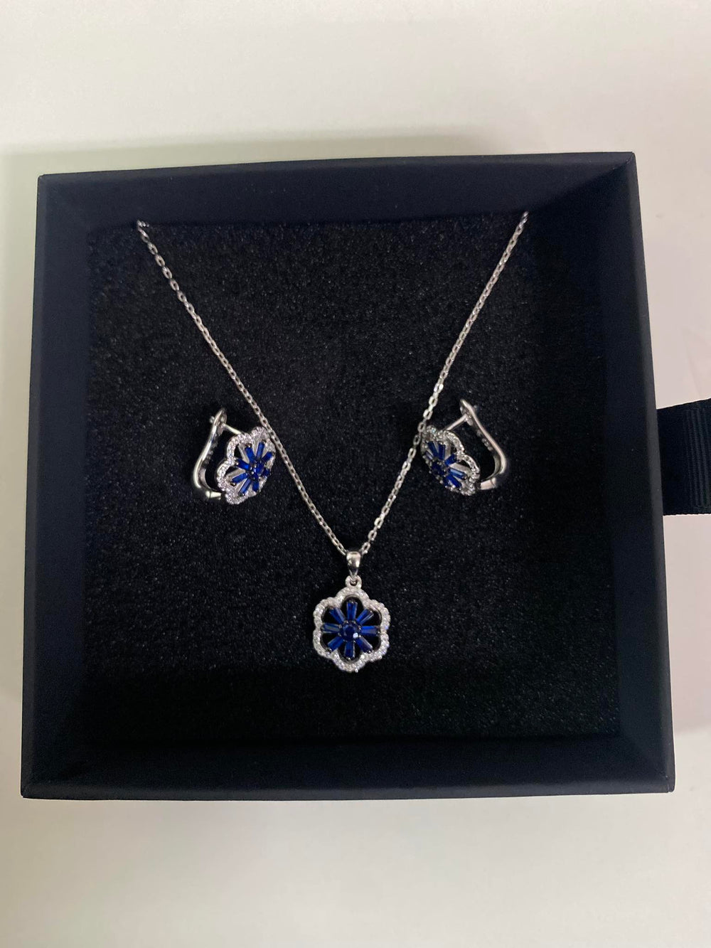 S804 FLOWER IN LONG BLUE PETAL N CZ IN SIDE 6.92G