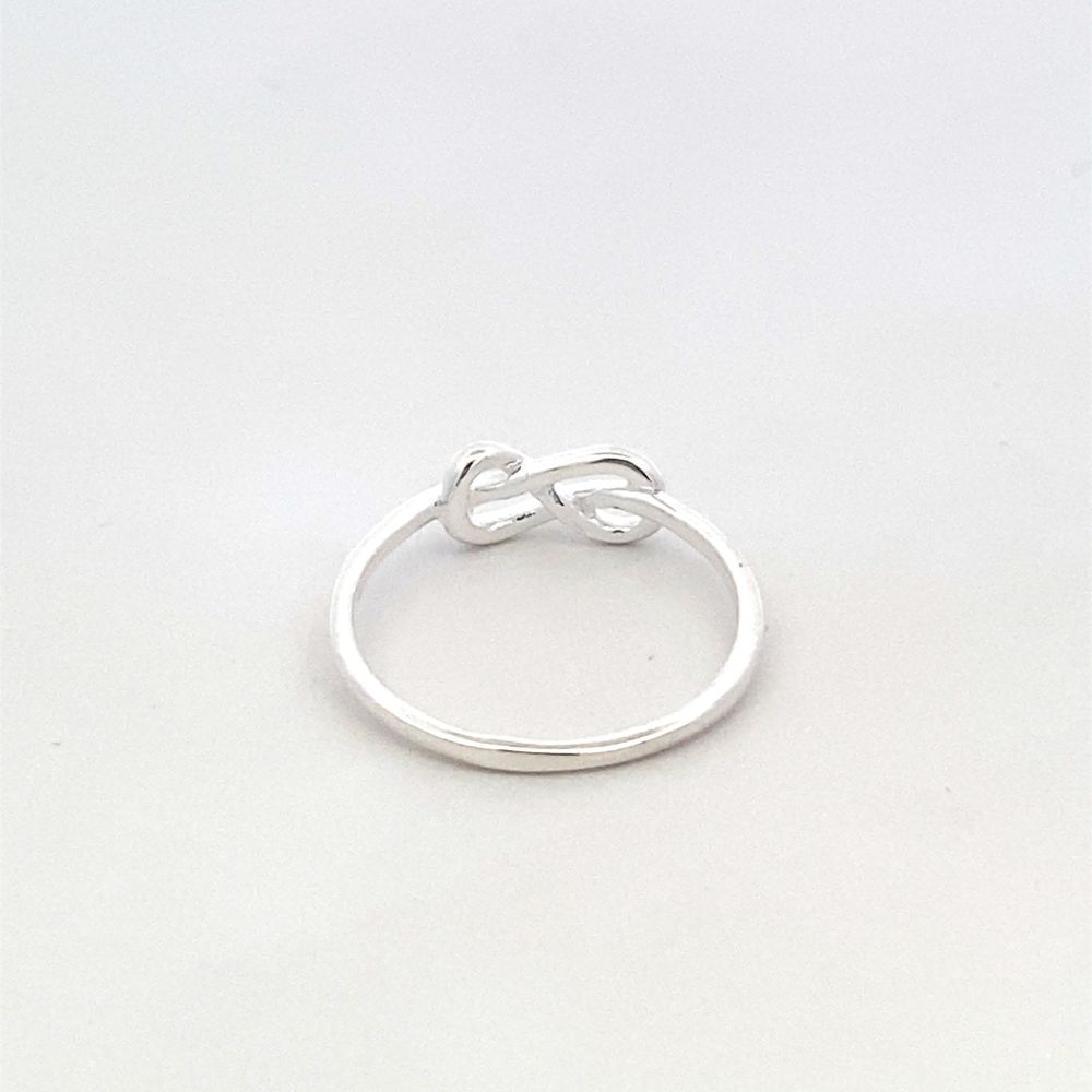 
                      
                        R64977 INFINITY KNOT RING 1.2G
                      
                    